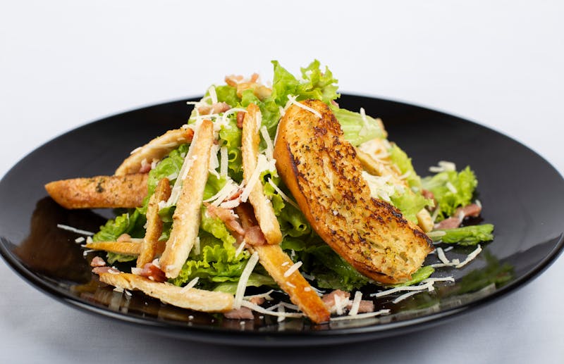 Classic Caesar salad with romaine, croutons and parmesan